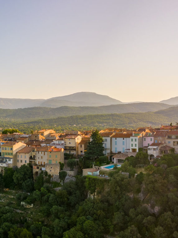 Early morning sun hits historic buildings in French mountain village